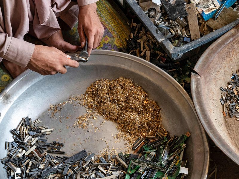 An Afghan smelter extracts gold