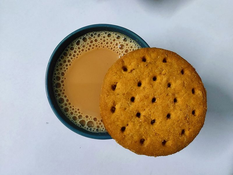 Karak tea with biscuit