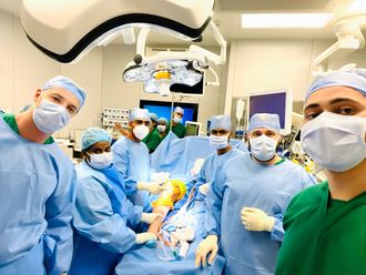 Dr. Karthikraj and Medcare medical team performing the cartilage transplant surgery