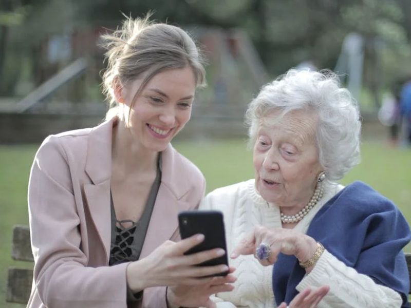 Elderly with young woman