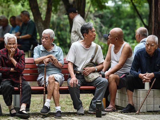 Elderly people rest at a park in Fuyang in eastern China's Anhui province