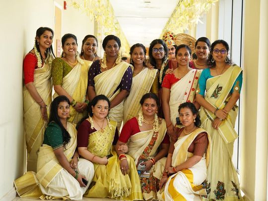 Malayali-nurse-Jinsu-Ann-Sabu-(standing-far-right)-and-colleagues-celebrate-Onam-at-a-hospital-in-Dubai-1726414471863