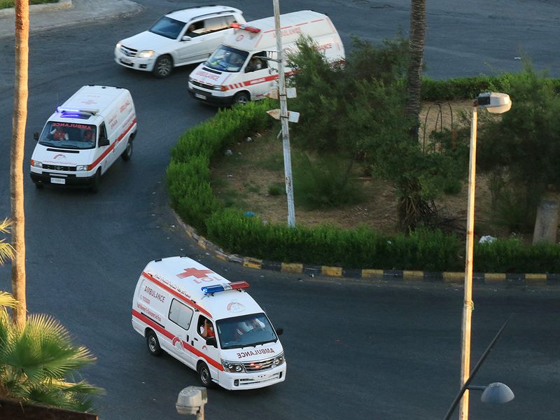 Ambulances rush wounded people to a hospital in the southern Lebanese city of Saida on September 17, 2024. 