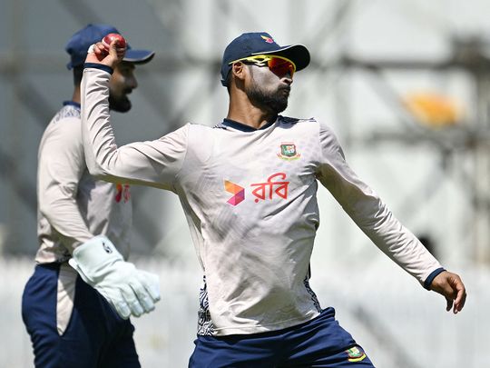 Bangladesh's captain Najmul Hossain Shanto (R) and Litton Das t