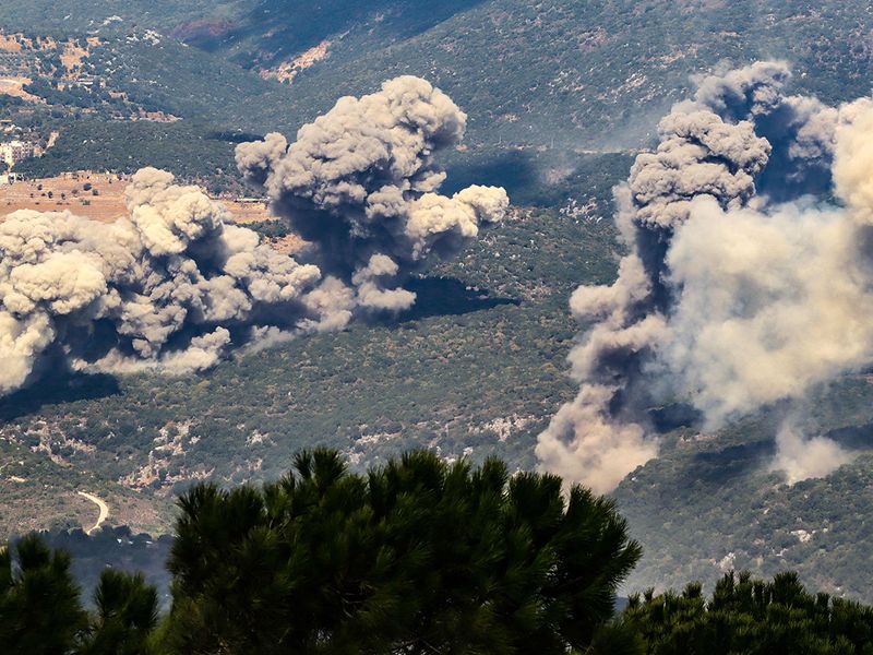 Smoke billows from the site of an Israeli strike