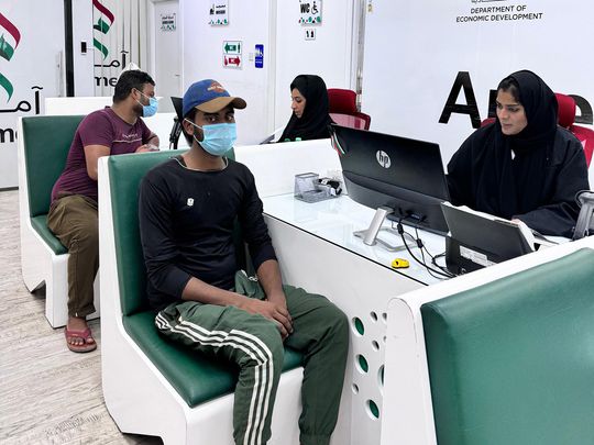 Applicants at an Amer customer service centre in Dubai