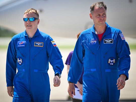 Russian cosmonaut Aleksandr Gorbunov (left) and NASA astronaut Nick Hague