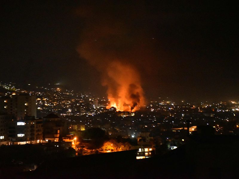 Smoke billows from the site of an Israeli airstrike 