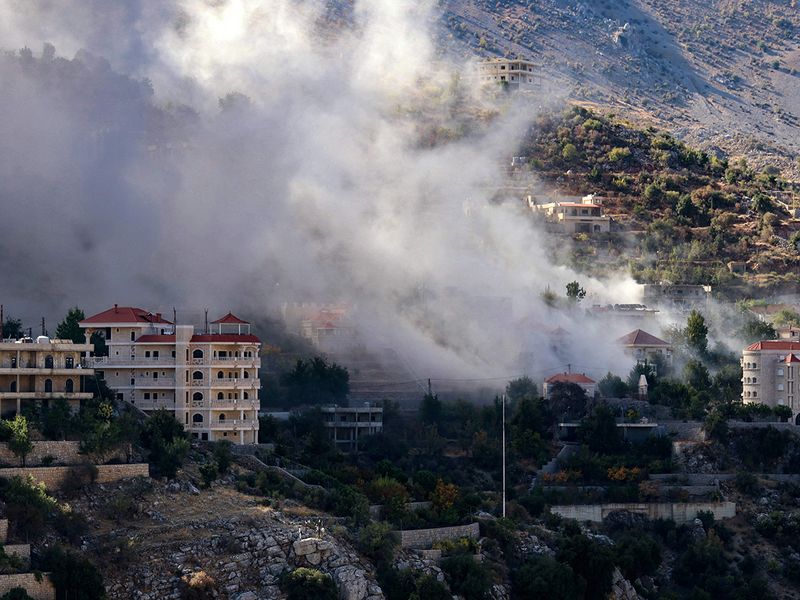 Smoke billows from the site of an Israeli airstrike t