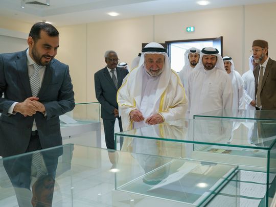 Following-his-speech,-Shj-ruler-tours-the-Al-Qasimi-Publications-office,-where-he-viewed-an-exhibition-displaying-original-manuscripts-of-his-works-1727716301428