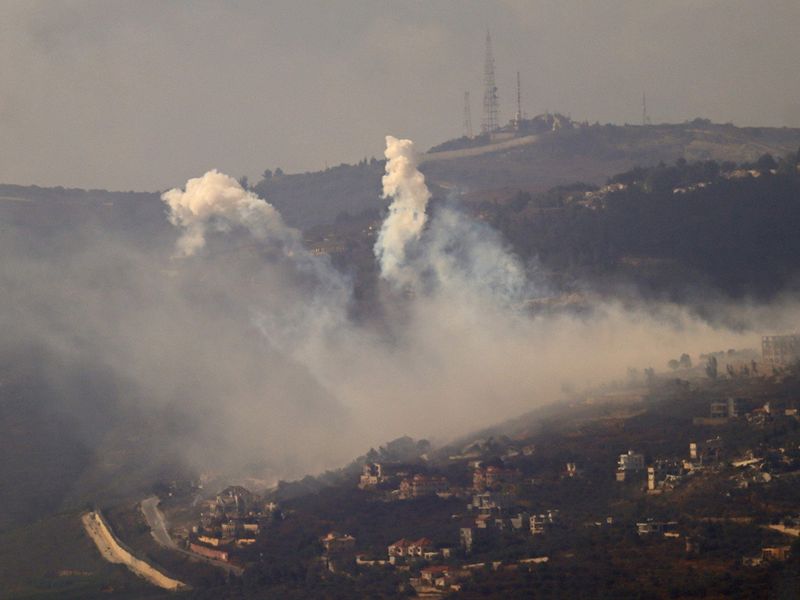 Smoke rises from the site of Israeli artillery shelling on the south Lebanon villages