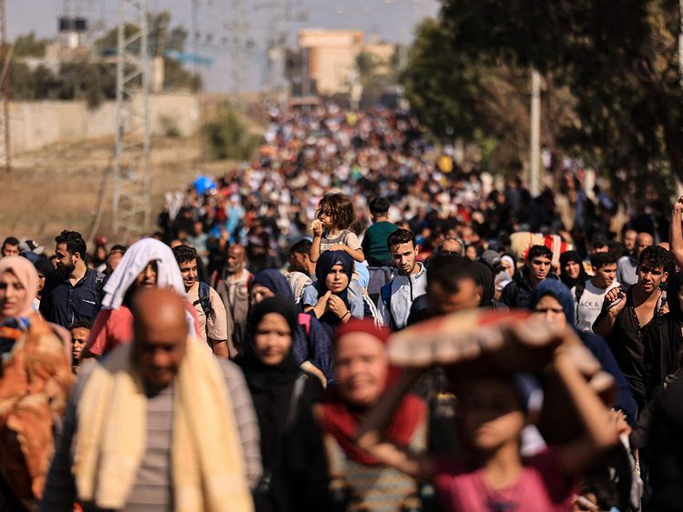 Palestinian families fleeing Gaza City