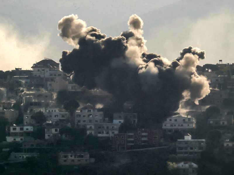 Smoke rises from the site of an Israeli air strike that targeted the southern Lebanese village of Khiam