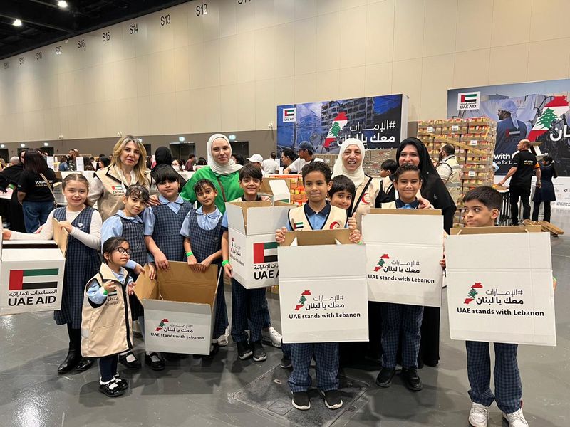 Young students of Dubai National School, Al Barsha, take part in the UAE Stands with Lebanon campaign at Expo City Dubai on Sunday.