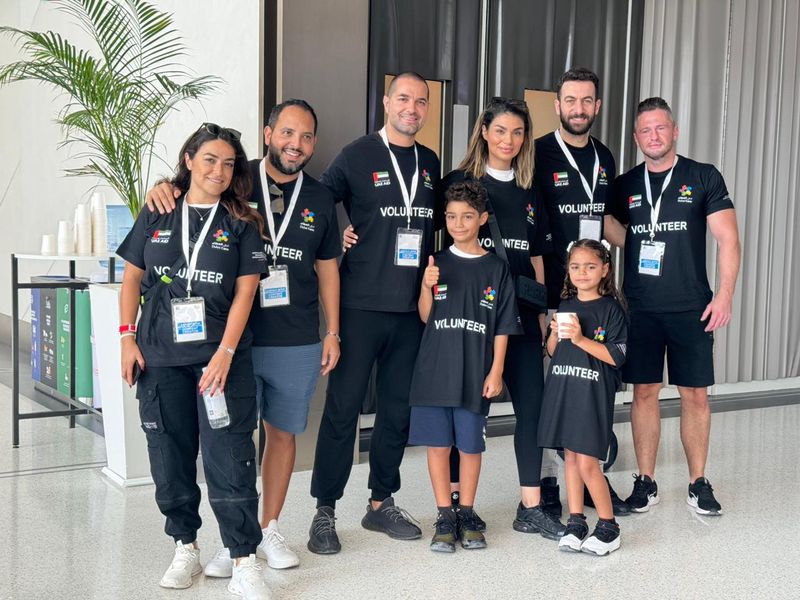 Zeina Khoury (third from right) with her children and other members from her family and company at the UAE Stands with Lebanon campaign in Dubai on Sunday