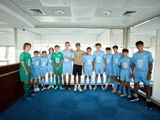 Oscar Bobb with City Football School players