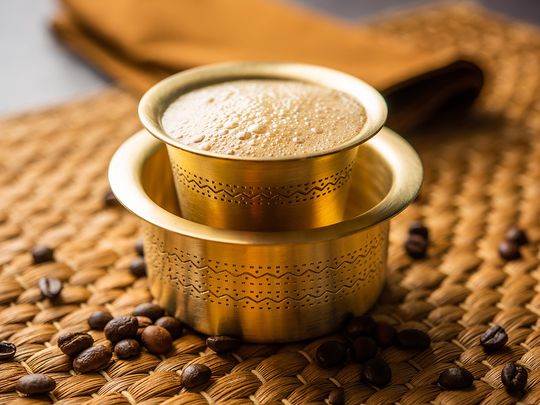 Traditional filter coffee served in a dabarah.