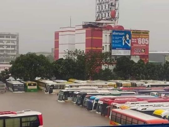 Scenes from a flooded bus terminal in Naga City