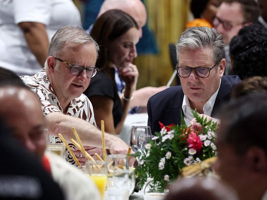 Australia's Prime Minister Anthony Albanese (L) and British Prime Minister Keir Starmer