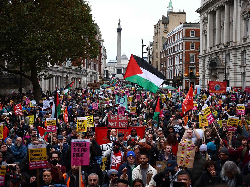 Protesters hold placards at a march