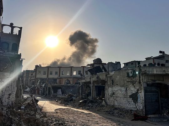 Smoke rises following an Israeli bombardment in Beit Lahia 