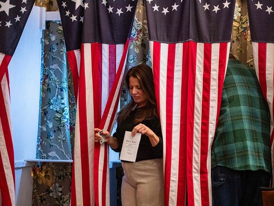 Residents of Dixville Notch cast their ballots in the US election at midnight