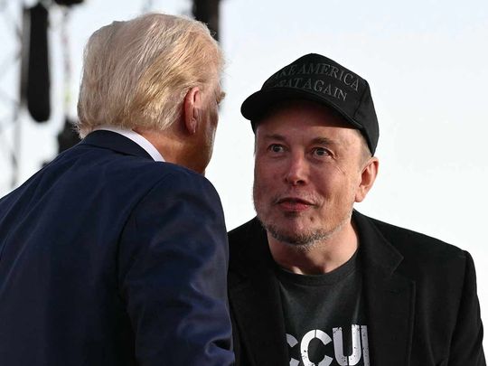 Tesla CEO Elon Musk with Donald Trump during a campaign rally