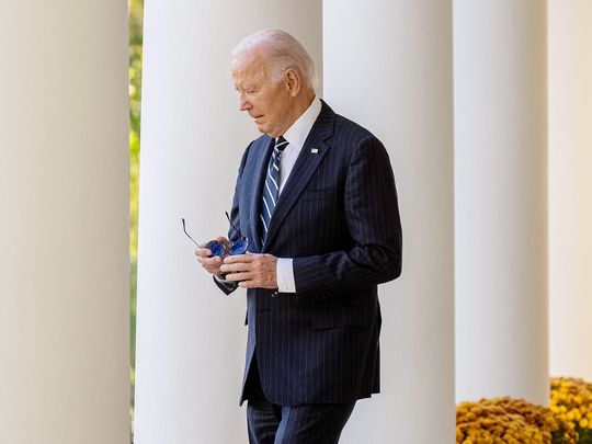 US President Joe Biden walks out of the Oval Office