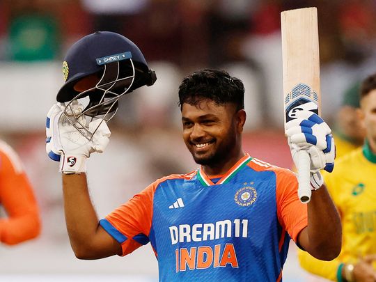 India's Sanju Samson celebrates reaching his century