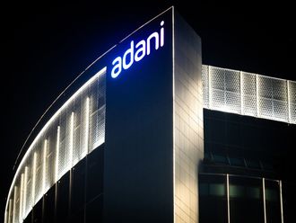 The Adani Group headquarters at night in Ahmedabad