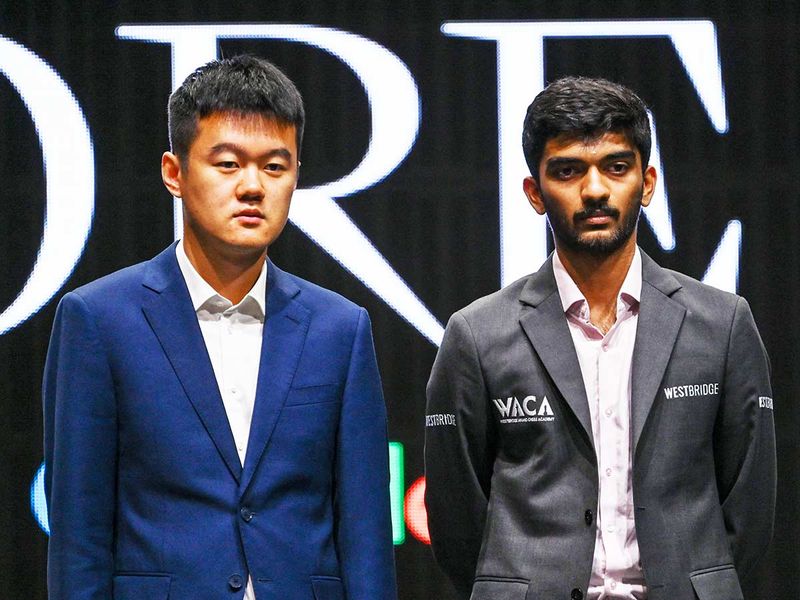 Chess grandmasters China’s Ding Liren (L) and India’s Gukesh Dommaraju (R)