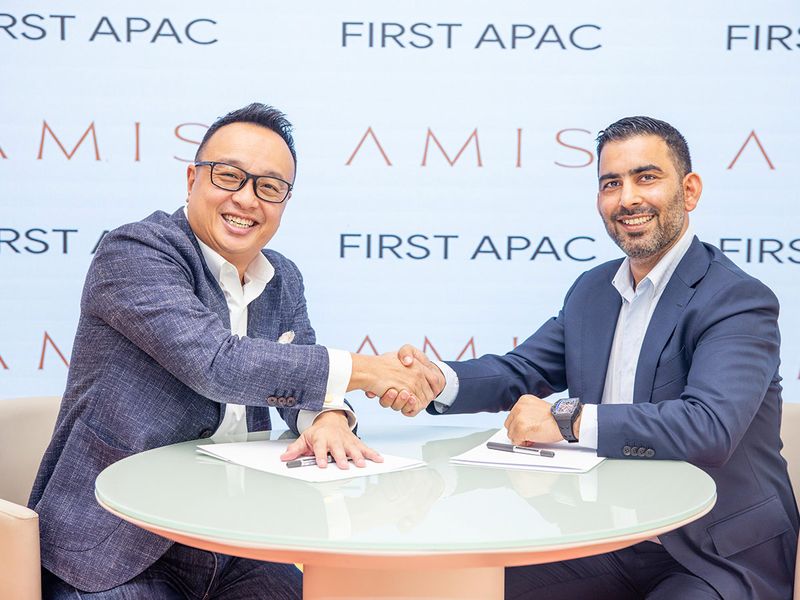 Left-to-right---Darrell-Lim,-Founder-and-Shareholder-of-the-First-APAC-Fund-VCC-and-Neeraj-Mishra,-Founder-and-CEO-of-AMIS-Development-during-the-MoU-signing