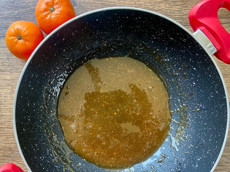 Prepare the orange syrup in a pan combining orange juice and sugar. 