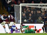 Aston Villa's midfielder Morgan Rogers (L) scores, but the goal is disallowed