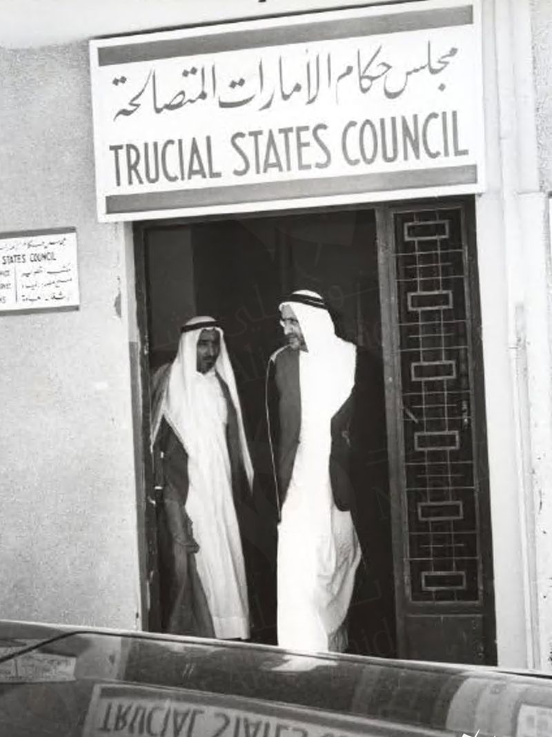 Sheikh Rashid bin Saeed Al Maktoum and Sheikh Saqr bin Mohammed Al Qassimi departing after Trucial States Council Meeting, Dubai, 1960s Â© Noor Ali Rashid Archives-1732795367440