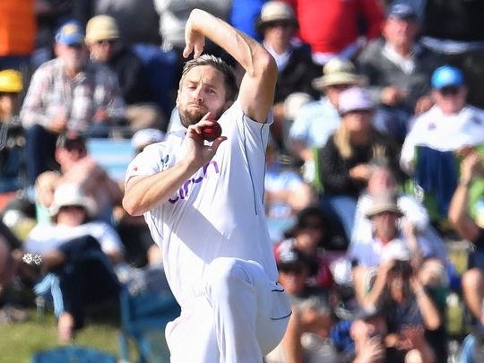 England's Chris Woakes bowls 