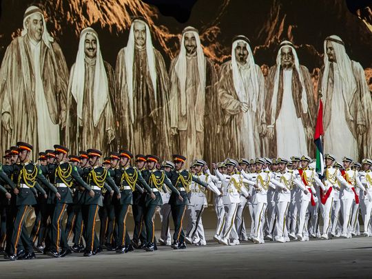 Members of the UAE Armed Force participate in the 53rd Eid Al Etihad official show, at the base of Jebel Hafeet. 