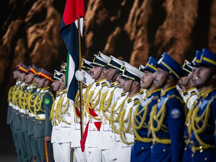 Members of the UAE Armed Force participate in the 53rd Eid Al Etihad official show, at the base of Jebel Hafeet. 