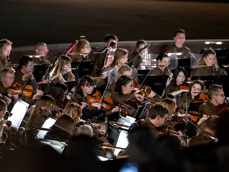 Musicians participate in the 53rd Eid Al Etihad official show، at the base of Jebel Hafeet. 