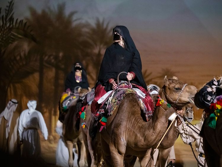 Performers participate in the 53rd Eid Al Etihad official show, at the base of Jebel Hafeet. 