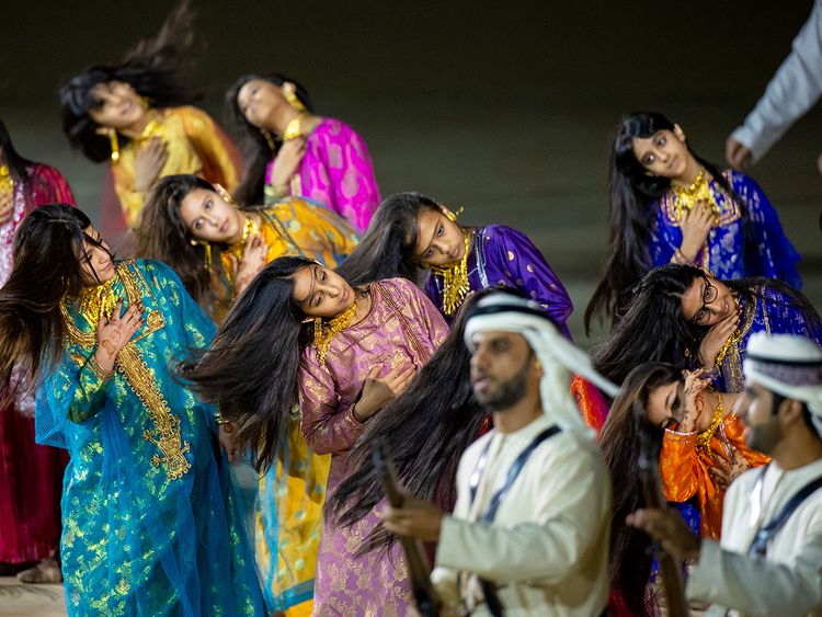 Performers participate in the 53rd Eid Al Etihad official show، at the base of Jebel Hafeet. 