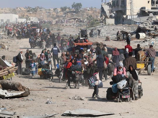 Palestinians, displaced from Beit Lahia, arrive in Jabalia in the northern Gaza Strip