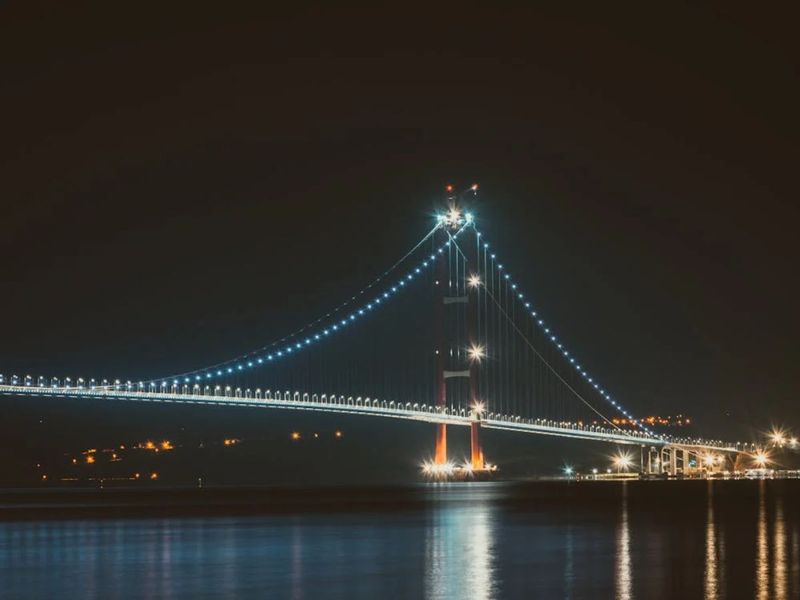 A night-time view of the 1915 Çanakkale Bridge in Turkey.