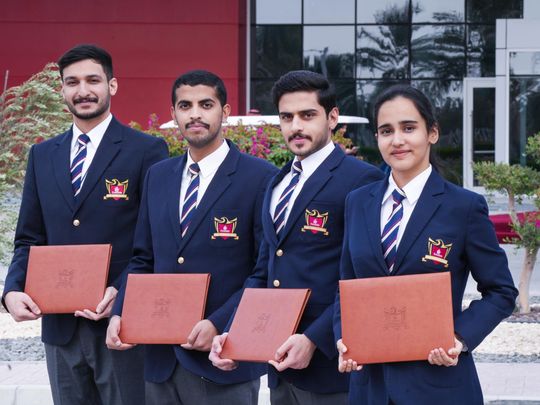 Outstanding cadet pilots Humaid Al Hammadi, Abdulla Alkaabi, Abdulla Raeisi and Sarah Shah after the graduation ceremony.-1734524015030