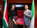 Mahash Saeed Alhameli, UAE Ambassador to the Republic of South Africa, presented the medal to Barbara Creecy.