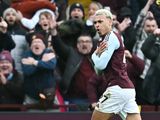 Aston Villa's midfielder Morgan Rogers celebrates 